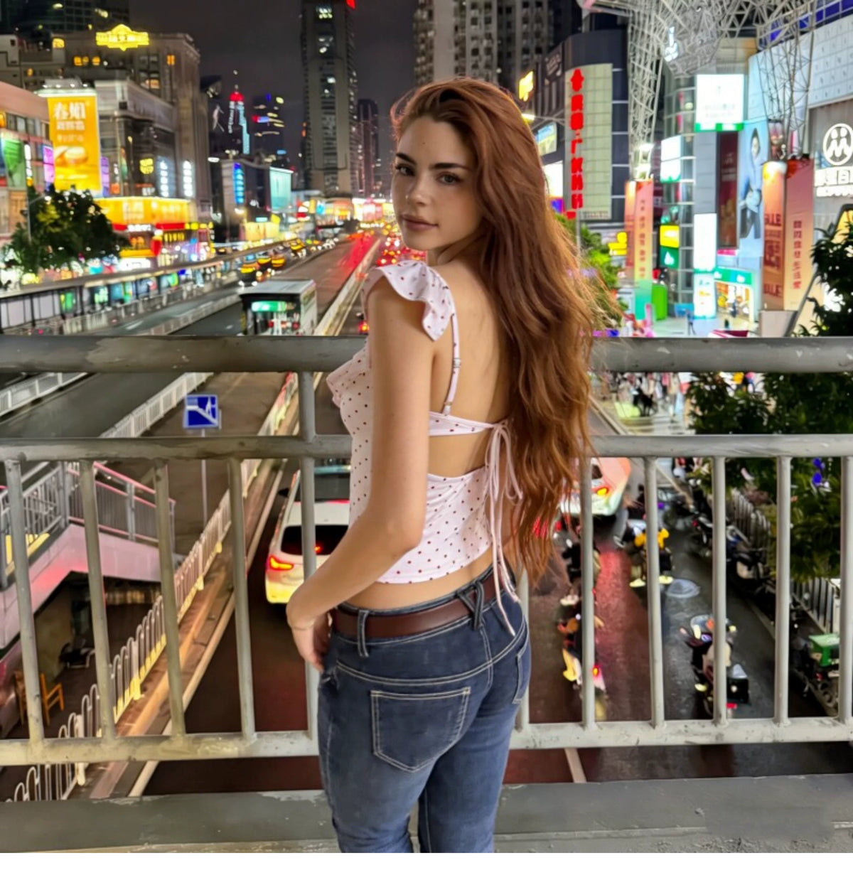Dot pattern ruffled low round-neck halter top with straps, revealing the back, elastic-waisted, form-fitting short blouse for women