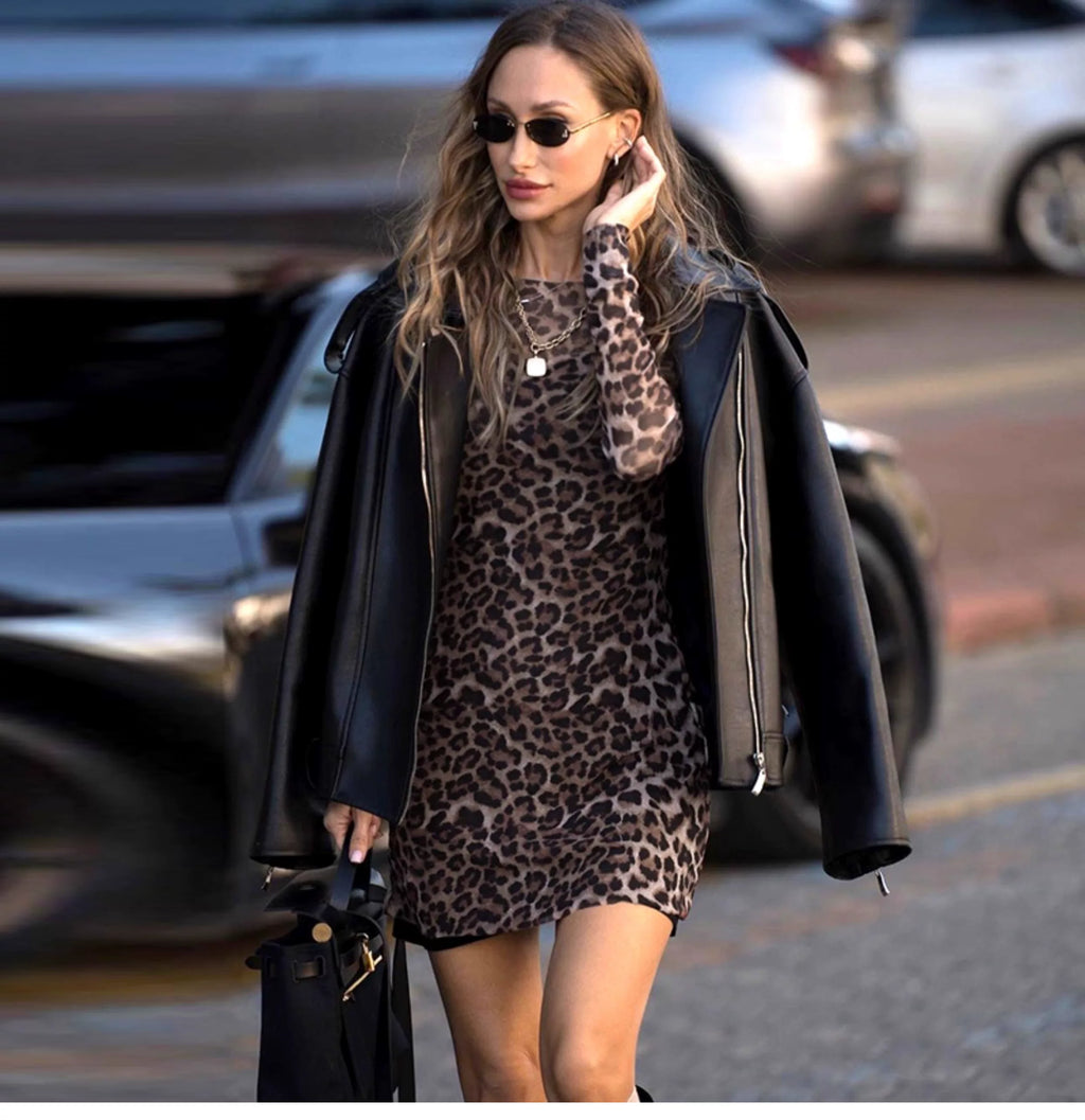 Purely sensual long-sleeved round-neck dress with net fabric and leopard print, paired with a strapless top set for women