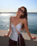 Sexy hot girl asymmetrical open satin strapless top with a belt, paired with a low-waisted half-length skirt set