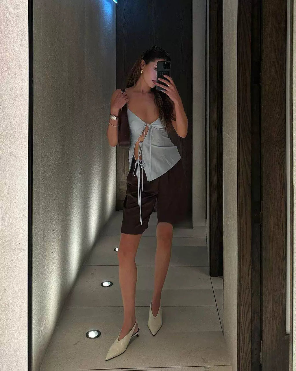 Sexy hot girl asymmetrical open satin strapless top with a belt, paired with a low-waisted half-length skirt set