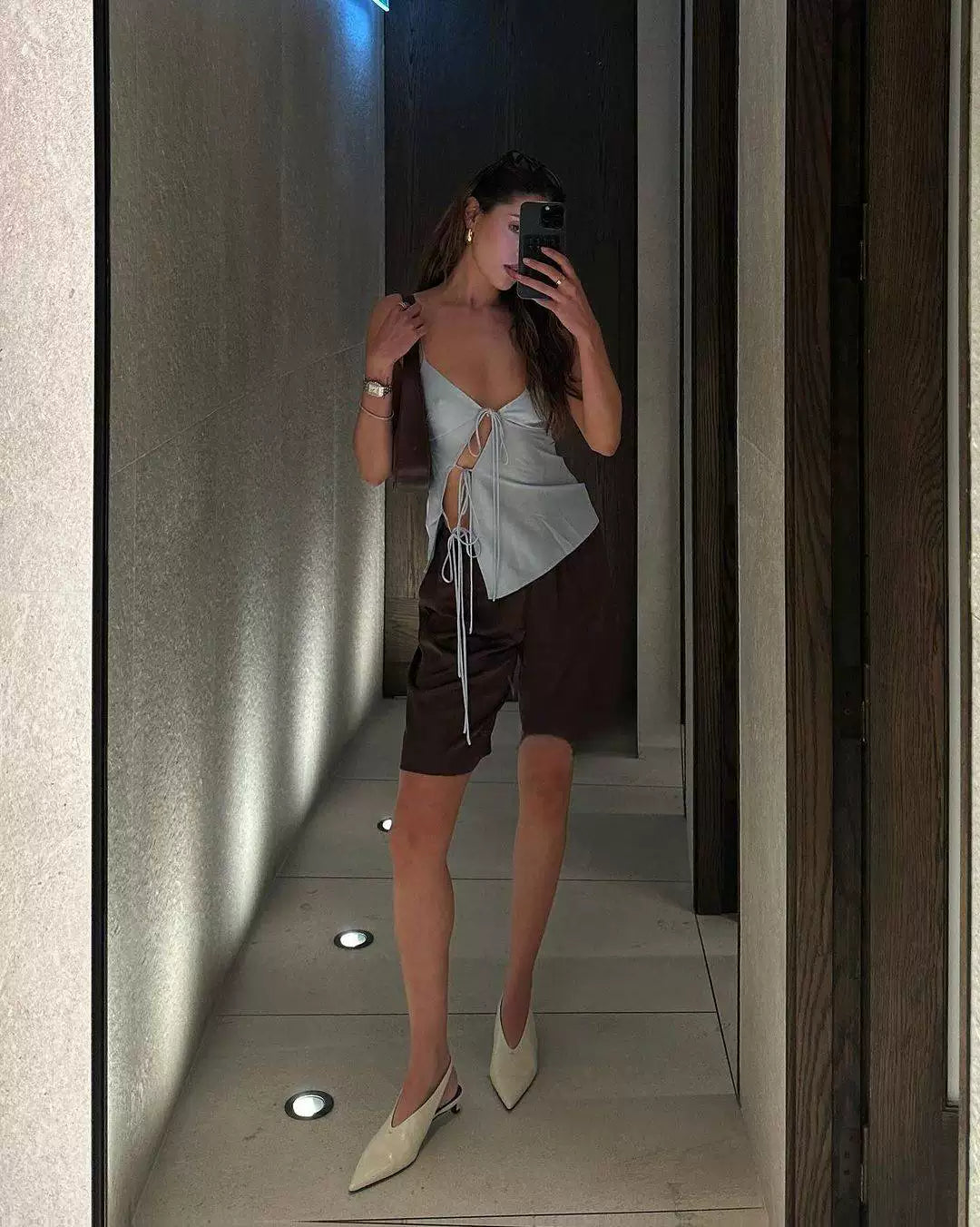 Sexy hot girl asymmetrical open satin strapless top with a belt, paired with a low-waisted half-length skirt set