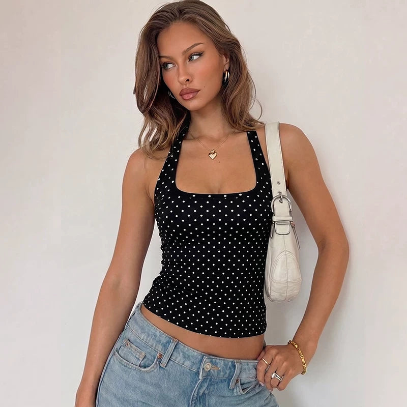 Hot girl polka dot printed neckless halter top with a feminine and erotic style V-neck revealing top for women