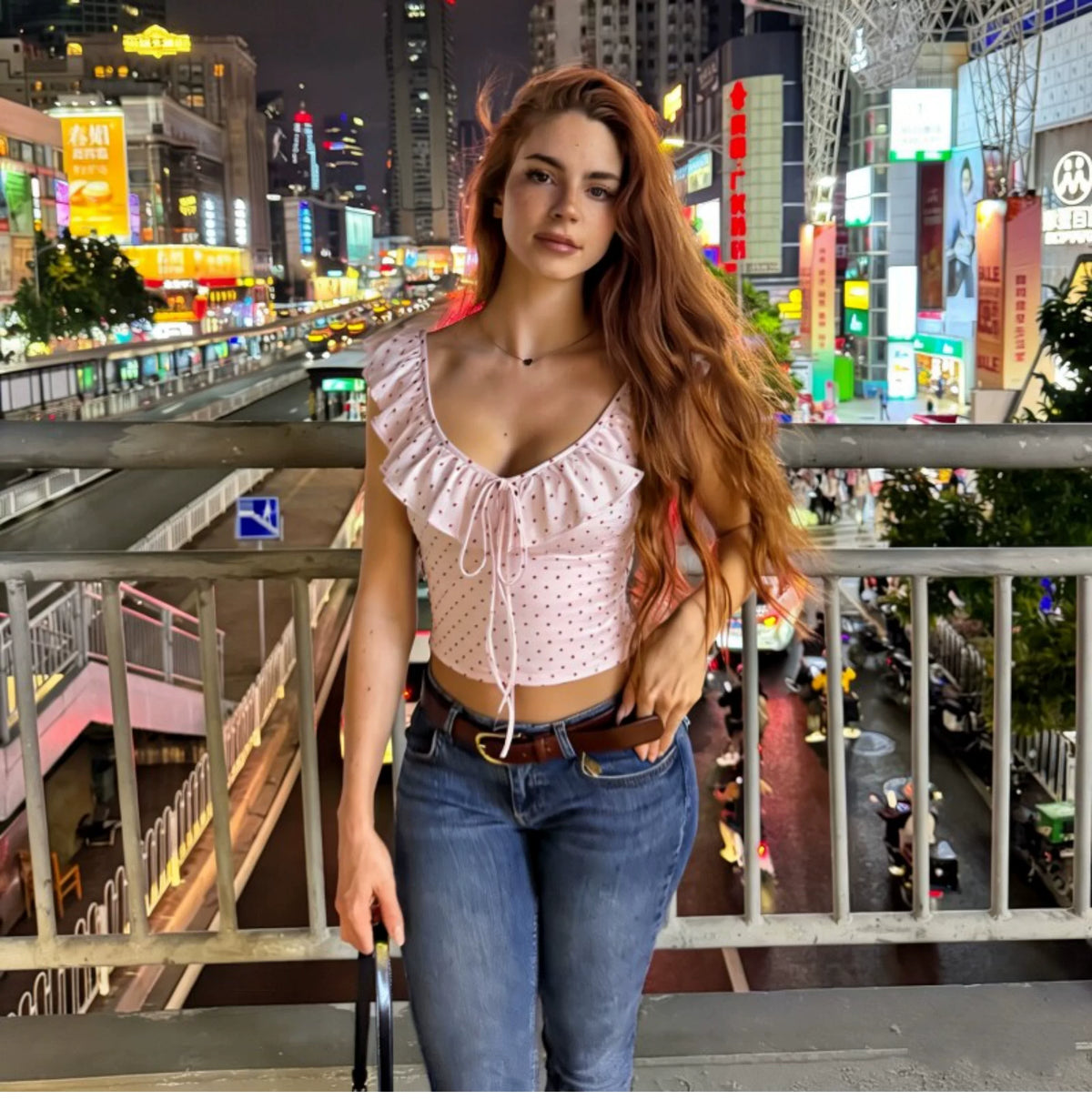 Dot pattern ruffled low round-neck halter top with straps, revealing the back, elastic-waisted, form-fitting short blouse for women