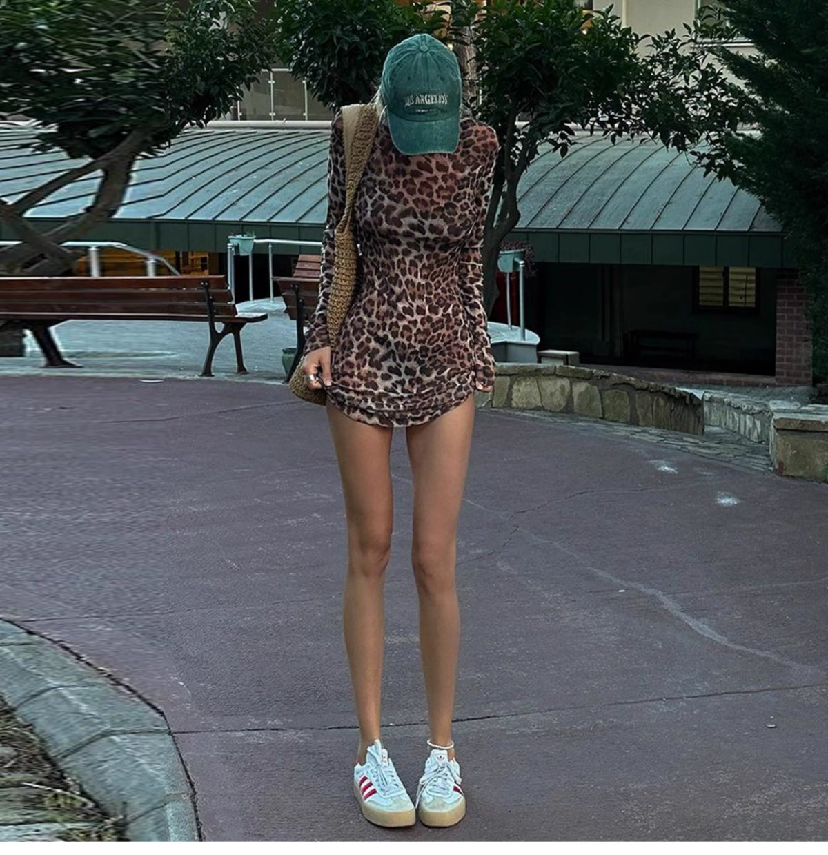 Purely sensual long-sleeved round-neck dress with net fabric and leopard print, paired with a strapless top set for women