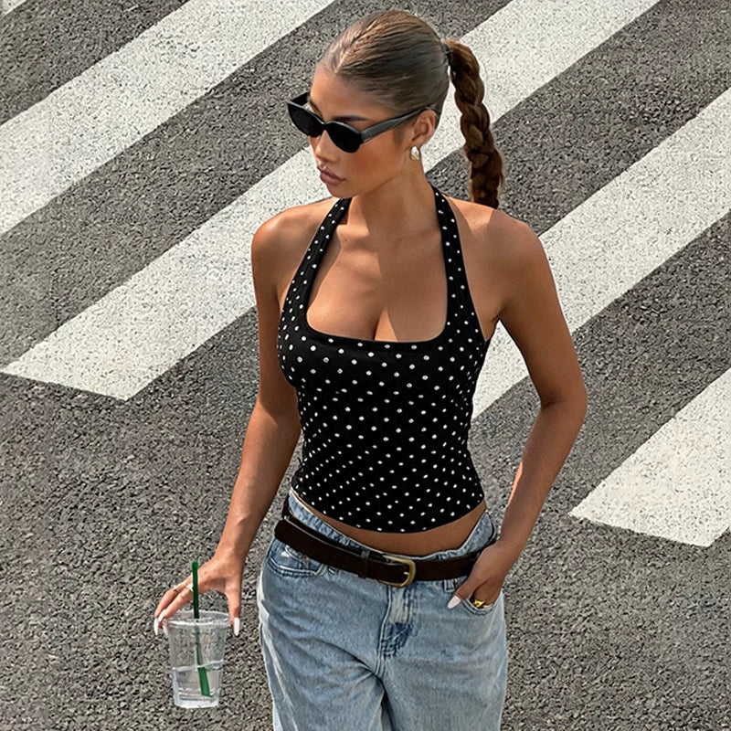 Hot girl polka dot printed neckless halter top with a feminine and erotic style V-neck revealing top for women