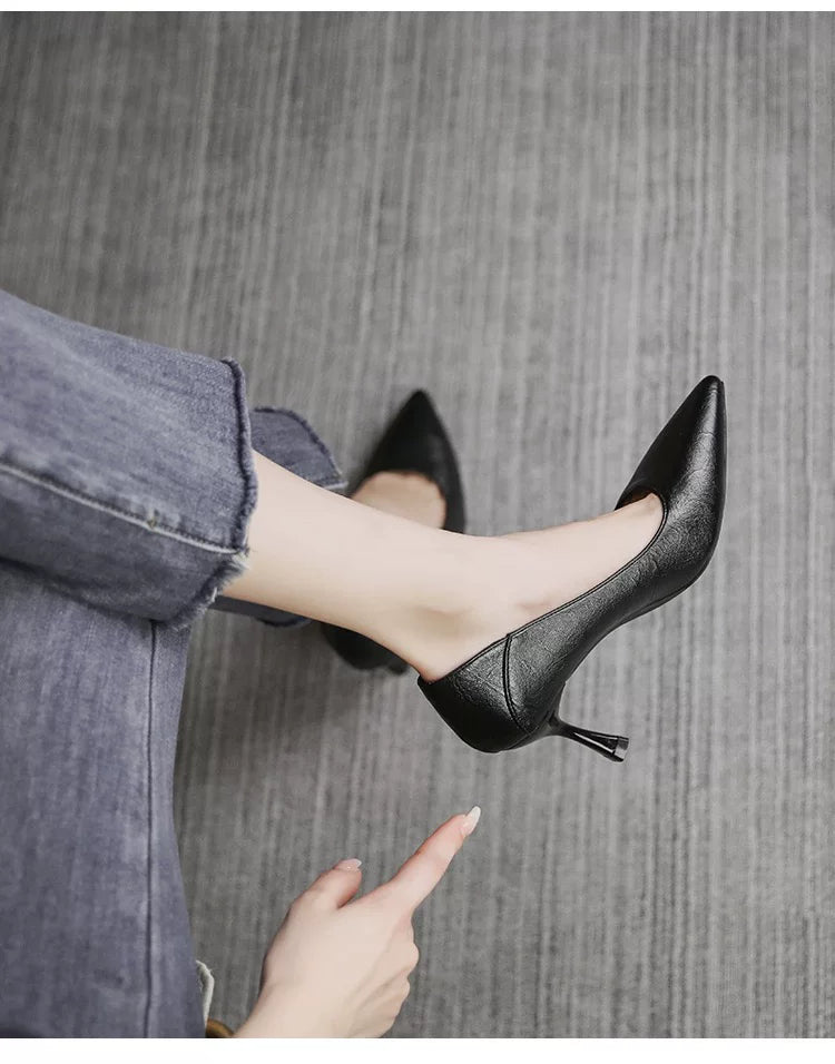 Comfortable high-heeled shoes with thin heels for office work and professional wear. Black single shoes made of soft leather, suitable for spring.
