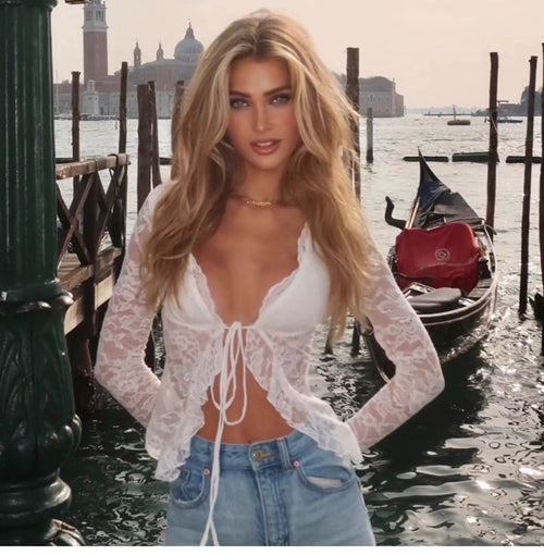 An attractive semi-transparent lace V-neck cardigan with drawstrings, suitable for various outfits, paired with a long-sleeved T-shirt or a short top for women.
