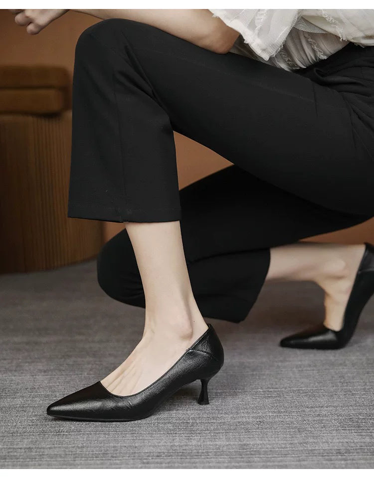 Comfortable high-heeled shoes with thin heels for office work and professional wear. Black single shoes made of soft leather, suitable for spring.