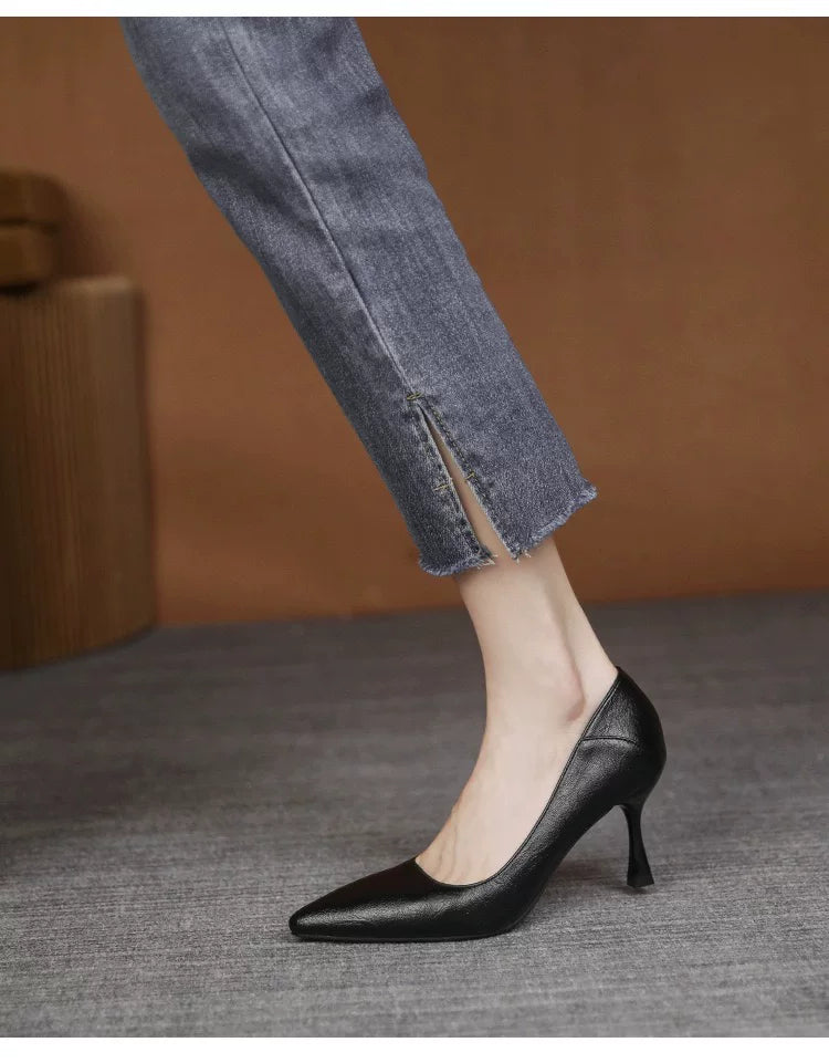 Comfortable high-heeled shoes with thin heels for office work and professional wear. Black single shoes made of soft leather, suitable for spring.