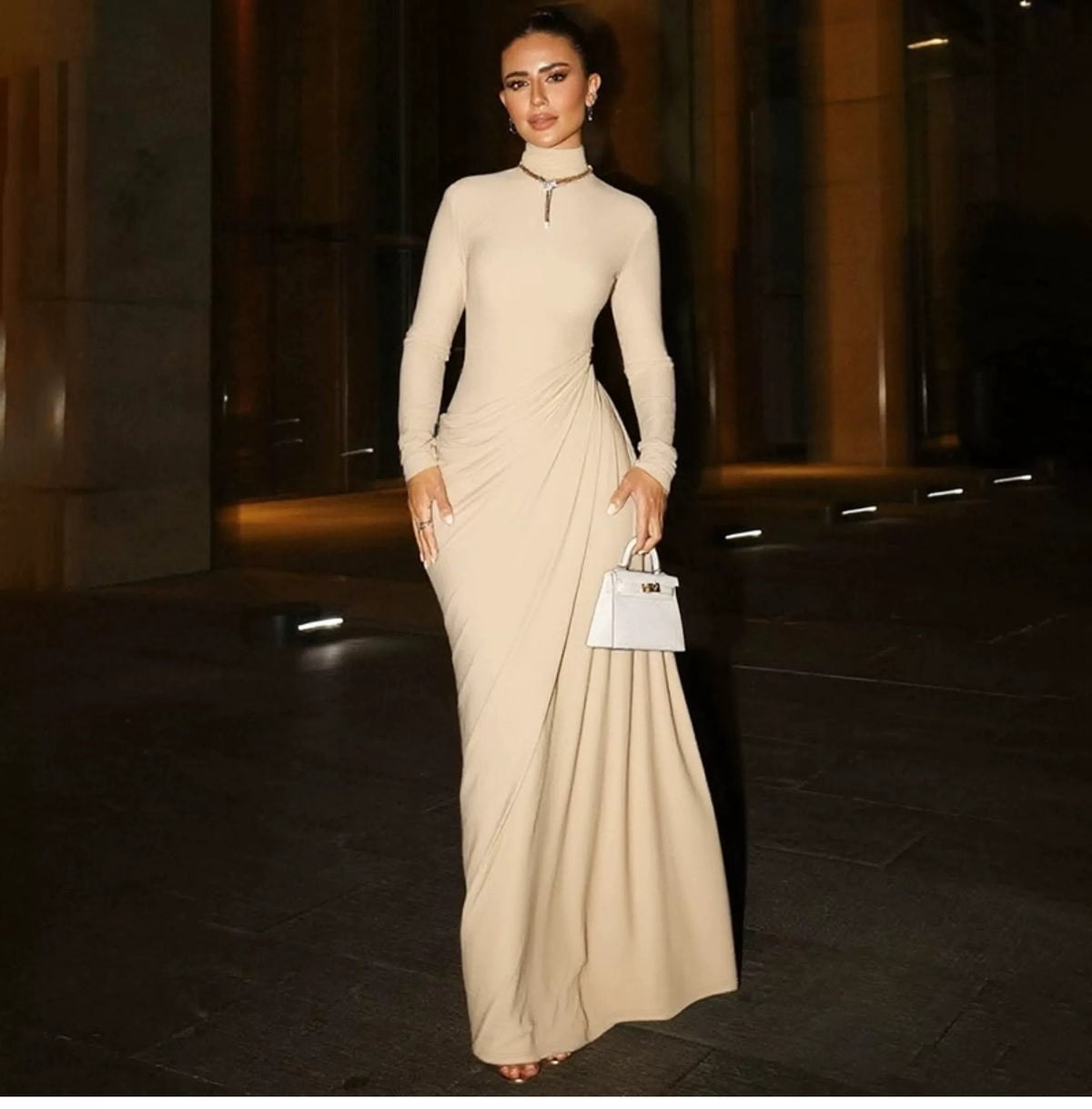 Buttoned half-collared long-sleeved dress for women with pleated high-waist design, featuring a seamless and slimming fit.